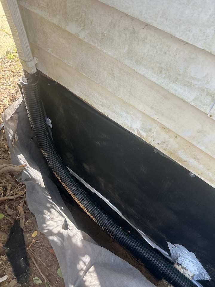 Our Trench Dig Outs service expertly excavates precise trenches to ensure effective drainage solutions, protecting your home's foundation from water damage and enhancing the longevity of your waterproofing systems. for Vazquez Crawlspace Services LLC in Durham, NC