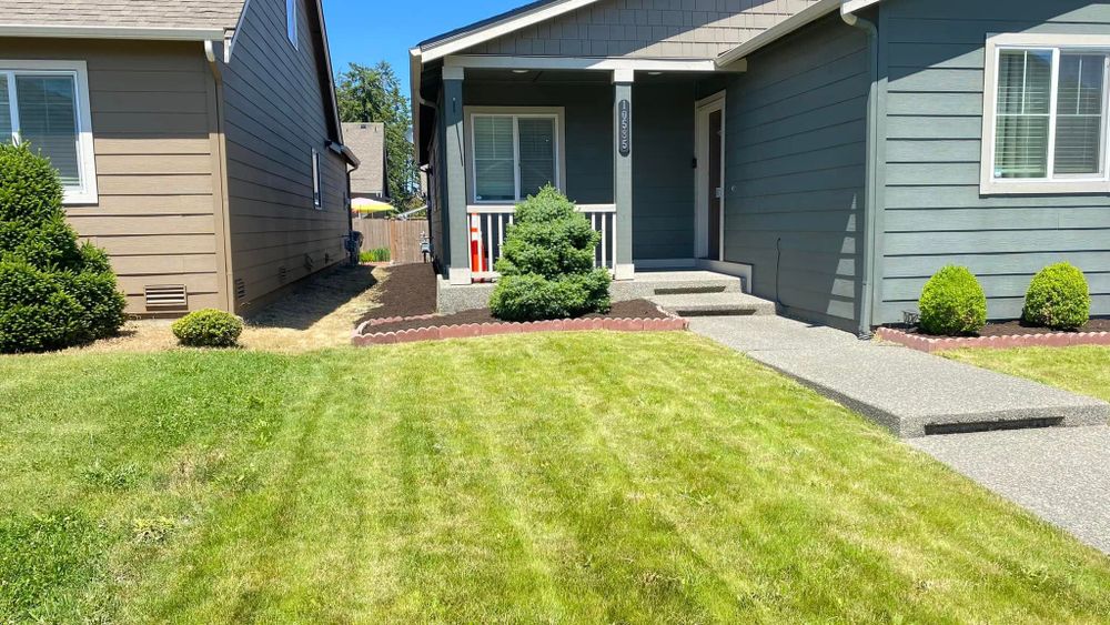 Enhance your home's curb appeal with our expert mowing services. Our team ensures a well-manicured lawn using precision techniques, providing your landscape with the perfect professional touch and healthy growth. for Family Landscaping & Irrigation in Auburn, WA