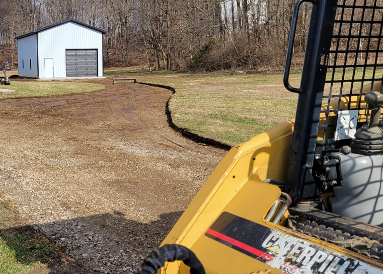 Our retaining wall construction service expertly enhances your landscape's functionality and aesthetics, providing durable support for soil management while adding a visually appealing structure to your outdoor space. for Admiring Landscapes in Lancaster, OH
