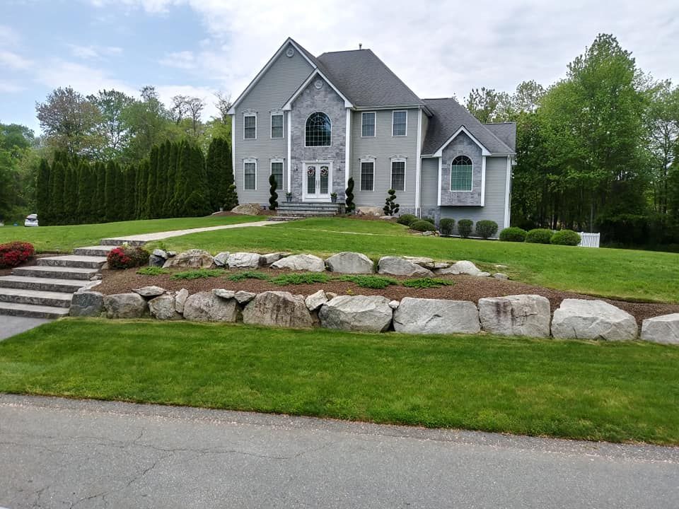 Enhance your garden's beauty with our professional mulch installation service, which helps retain soil moisture, suppresses weeds, and enriches the soil for healthier plants and improved curb appeal. for Cadieux's Landscaping in Somerset, MA