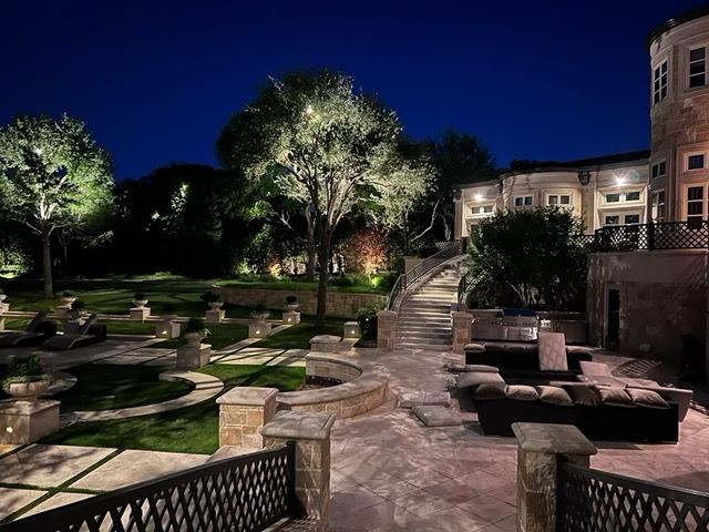Illuminate your landscape with our Tree Lights service. We expertly design and install lighting to highlight your trees, enhancing aesthetic appeal and adding safety to your outdoor spaces at night. for A Realtree Service in Garland, TX