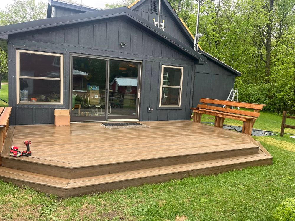 Transform your outdoor space with our expert deck & patio installation service, offering quality craftsmanship and design tailored to enhance your home's beauty and functionality. Enjoy personalized solutions that fit your lifestyle. for One Construction Inc in Raymond, MN
