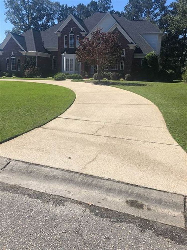 Our professional driveway pressure washing service will remove dirt, grime, and oil stains, restoring the beauty of your driveway and increasing curb appeal. Trust us to keep your property looking pristine. for Nate's Lawn Services in Braidwood, IL