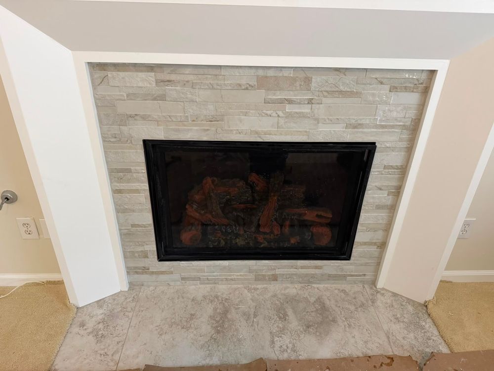 Custom tile installation for fireplace walls.
 for Alpha Tiles LLC in Atlanta, GA