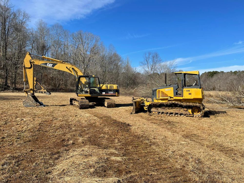 Our Skid Steer Work service offers precise and efficient land clearing, grading, and material handling for homeowners. Enhance your property's landscape with our skilled operators using reliable, top-of-the-line equipment. for Maness Trucking & Excavation in Lexington, TN