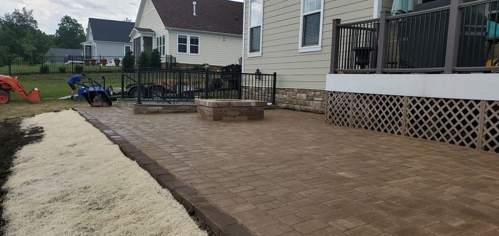 Our Patio Design & Construction service offers homeowners the opportunity to create a beautiful, functional outdoor space perfect for entertaining or relaxing. Enhance your property with our expert craftsmanship and design expertise. for Lakeside Landscaping  in Gordonsville, VA