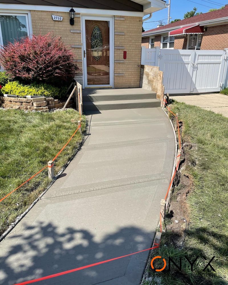 Our Stair Design & Installation service offers homeowners the opportunity to enhance their property with durable and visually appealing concrete stairs tailored to fit their unique aesthetic preferences and functional needs. for Onyx Concrete Contractors in Chicago, IL