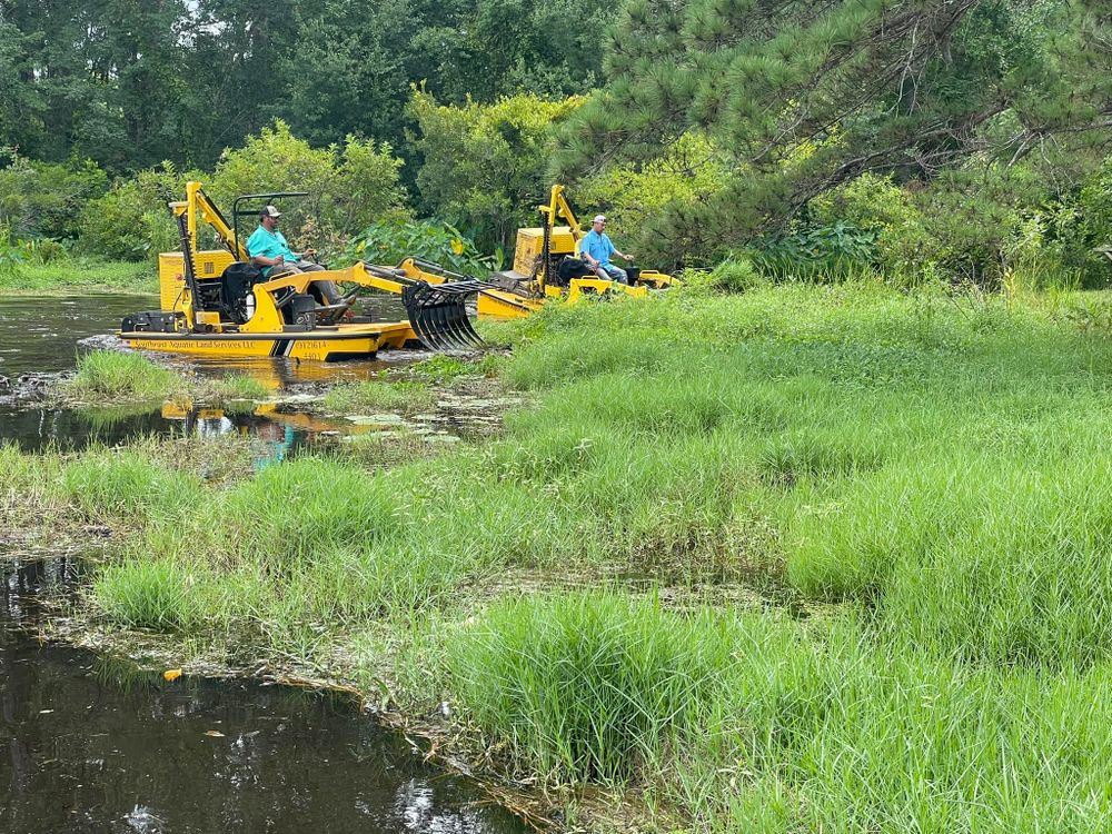 Our Waterway Clearing service helps homeowners maintain the health and beauty of their landscape by removing debris, vegetation, and obstacles from water bodies on their property to ensure proper drainage. for Southeast Aquatic Land Services LLC  in Waycross, GA