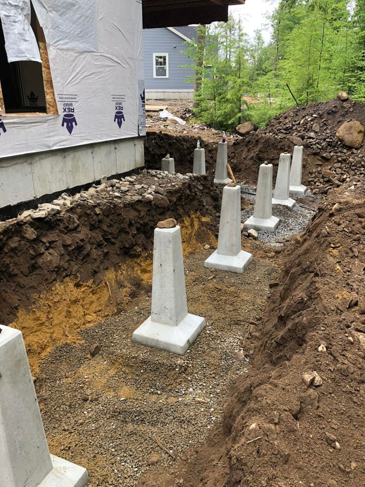 Discover the meaning of excavation through our expert service, preparing your landscape for stunning hardscaping projects by efficiently removing earth, ensuring a solid foundation for patios, driveways, and more. for Pine Stream Property Management in Waterboro, ME