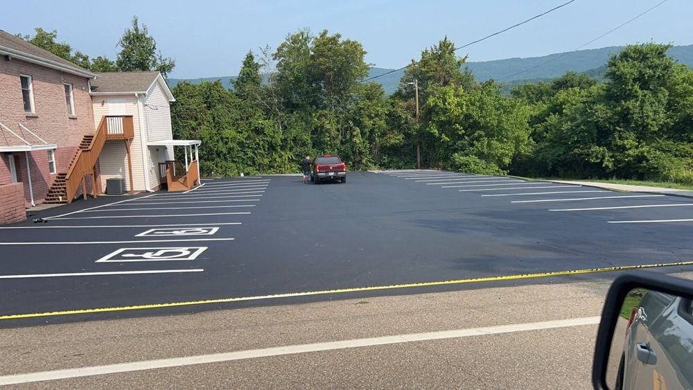 Our Parking Lot crack filling service expertly seals cracks to prevent further damage, enhance durability, and extend the life of your pavement, ensuring a smoother and safer surface for years. for Asphalt Animals in Little Rock, AR