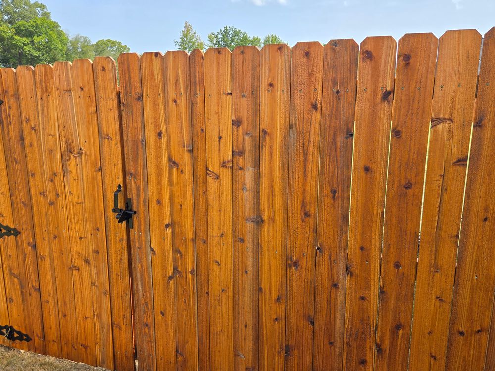 Fence staining for Patriot Fence  in Oakland, TN