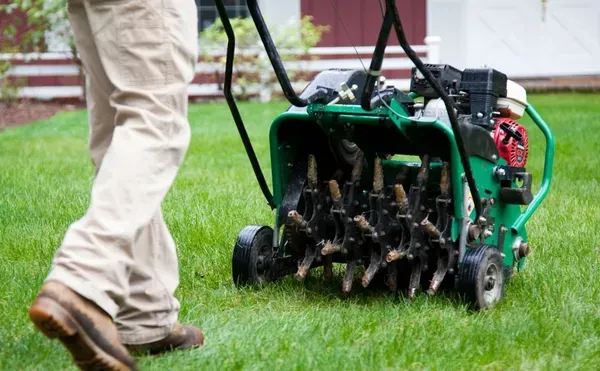 Our Lawn Aeration service involves puncturing soil with small holes to allow air, water, and nutrients to penetrate grassroots for healthier and more vibrant lawn growth. Enhance your yard today! for Delgado Landscape Management  in St. Charles,  MO