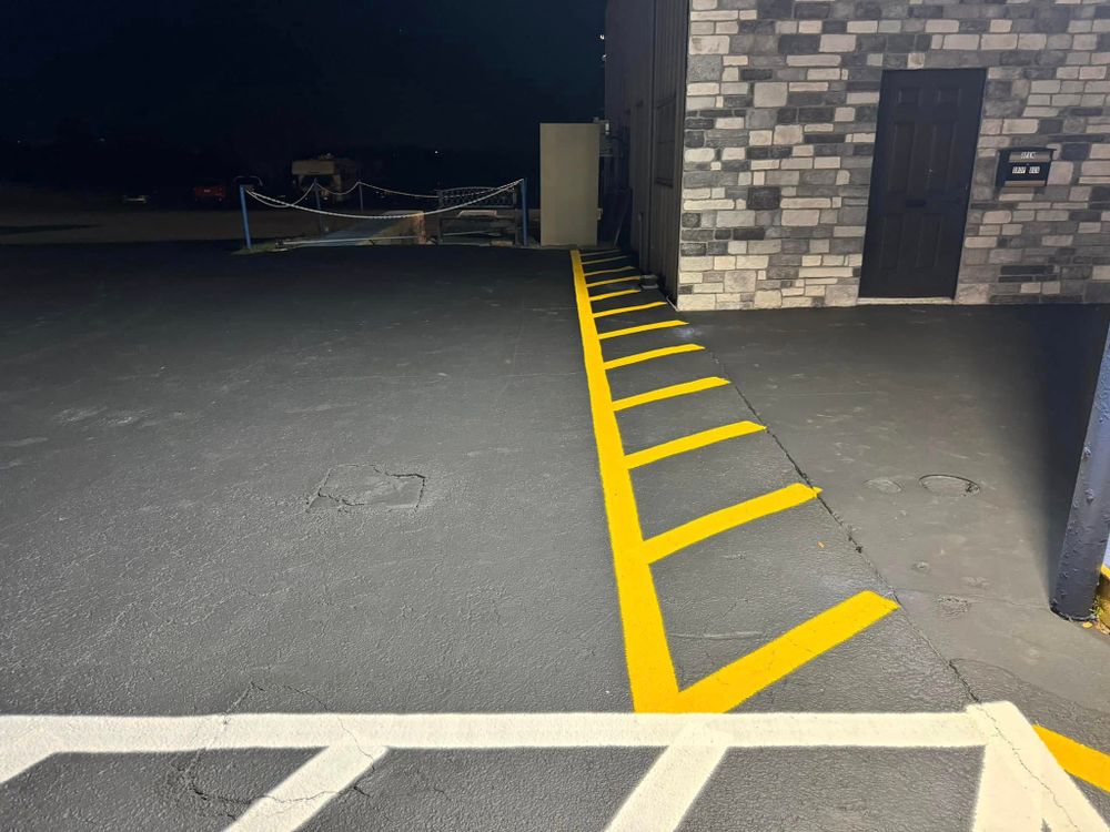Enhance your property's curb appeal and safety with our professional striping service, offering precise markings for driveways and walkways to ensure clear guidance and a polished finish on existing pavement. for Pavesheild in Haines City, FL