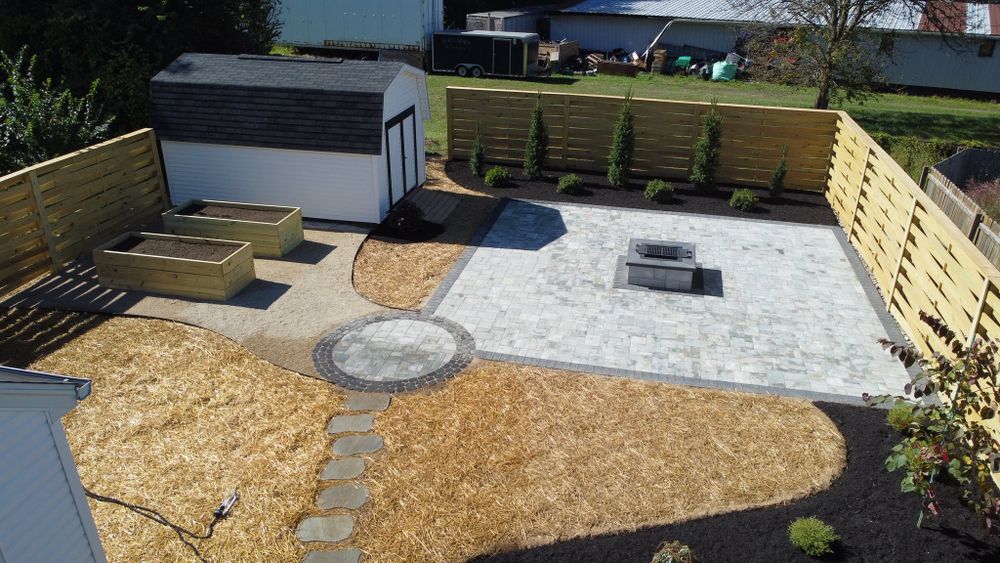 Enhance your outdoor living space with our expert patio design & construction services. We create beautiful, durable patios tailored to your vision, ensuring functionality and style seamlessly blend into your landscape. for New Image Outdoor Solutions in Dayton, Ohio