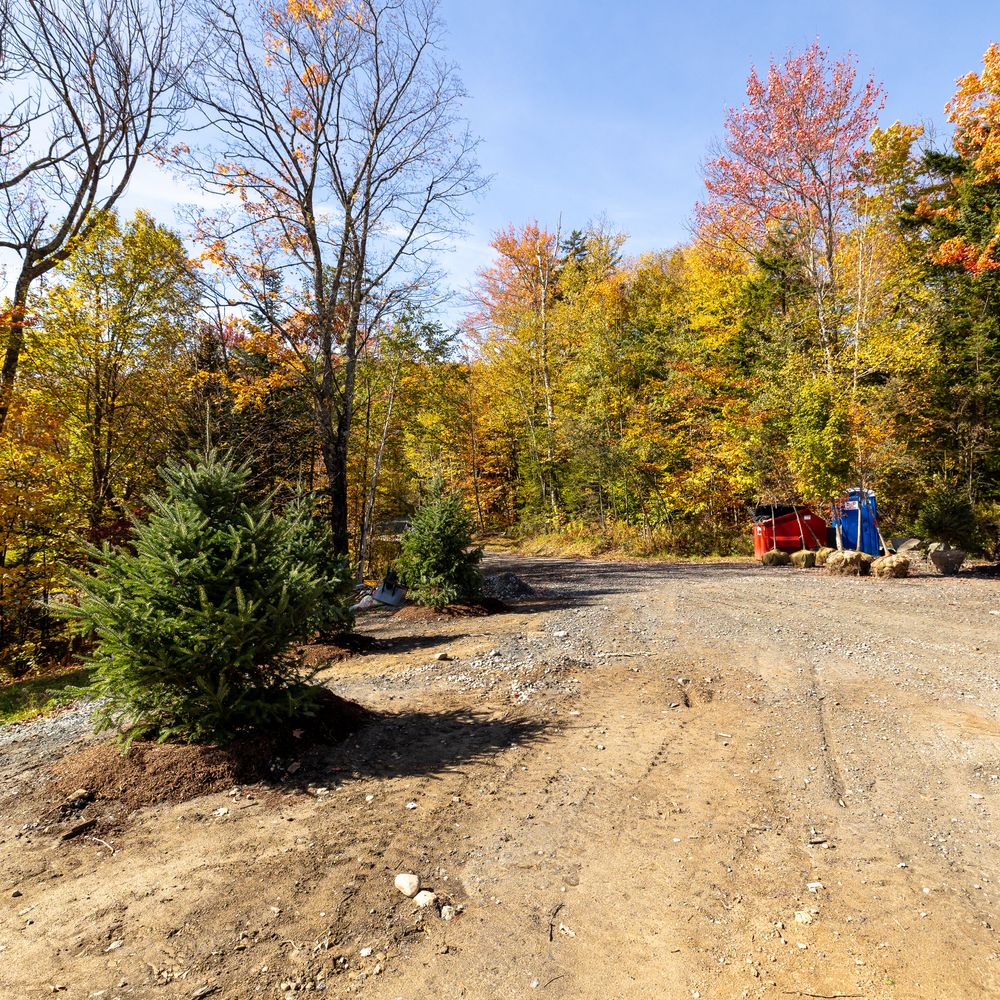 Carving a Pond into a Mountain Side for Andy Naylor Excavation in Stowe, VT