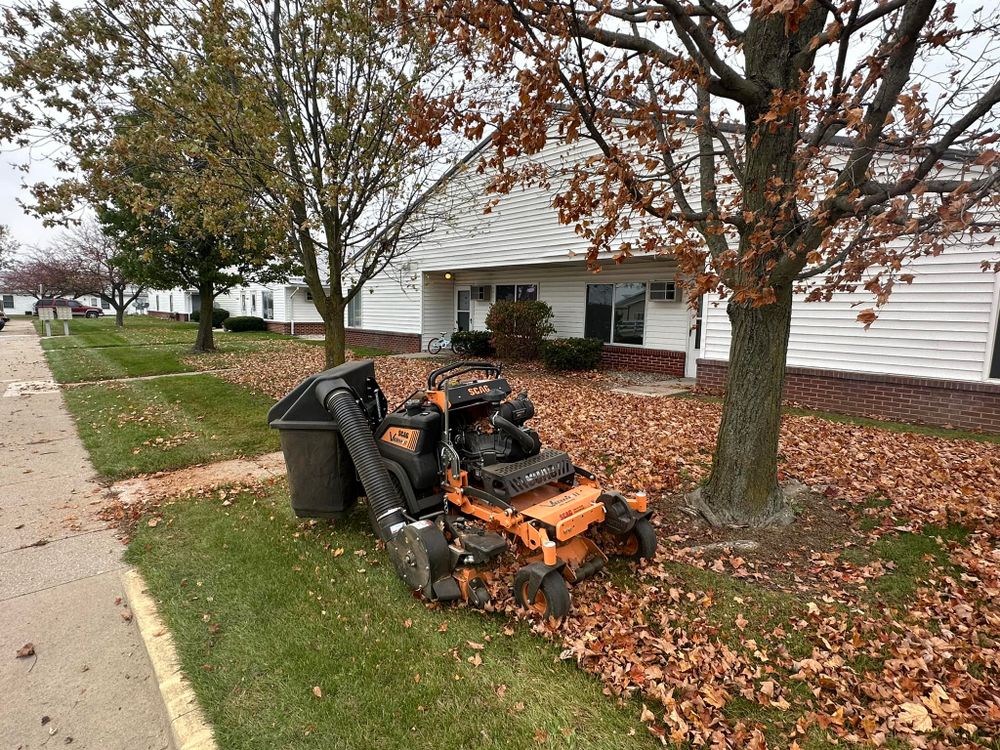 Our Fall and Spring Clean Up service includes raking leaves, removing debris, trimming bushes, and preparing your yard for the changing seasons to maintain a beautiful landscape year-round. for FIRST CLASS GRASS LLC in Syracuse, IN