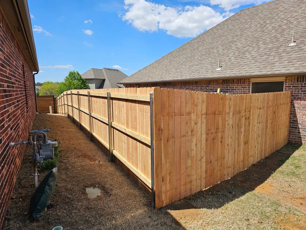 Our Fence Repair service ensures your property's security and aesthetics by fixing damaged sections, reinforcing stability, and restoring the appearance of your fence efficiently with high-quality materials for lasting results. for Kalos Decks and Fences  in Bixby, OK
