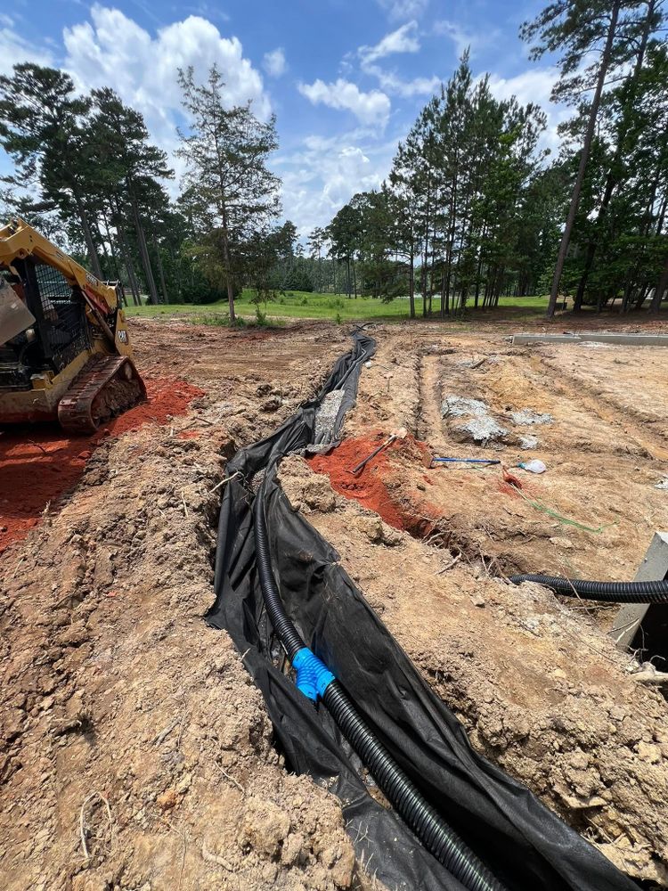Our trenching service provides precise, efficient excavation for utilities and landscaping projects, ensuring optimal placement of pipes and cables while maintaining the integrity of your property. Reliable, professional solutions tailored to your home’s needs. for Clarks Hill Property Solutions in McCormick, SC