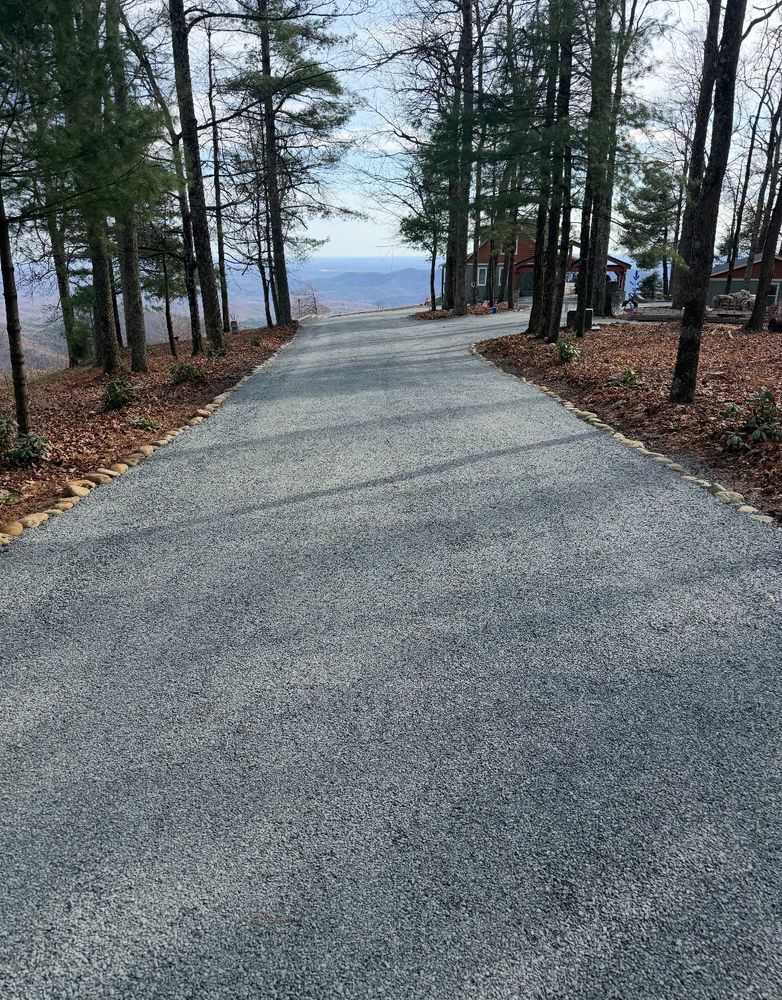 Enhance your driveway with our Tar and Chip service, delivering a durable, textured surface that combines affordability and aesthetics. Enjoy reliable traction and an appealing rustic finish for your home. for Old South Grading in Glade Valley, NC