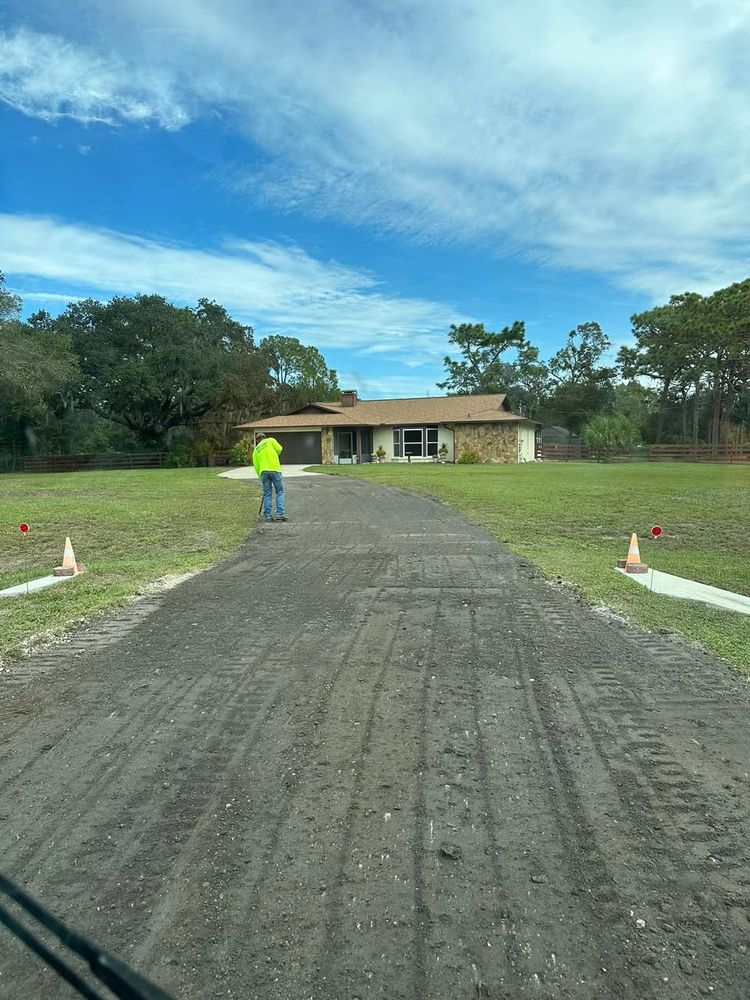 Our Driveway Design & Build service provides homeowners with personalized and durable solutions, ensuring quality craftsmanship while optimizing driveway cost to fit your budget. Transform your property with our expert excavation team today. for Windspirit Land Services in Hillsborough County, FL