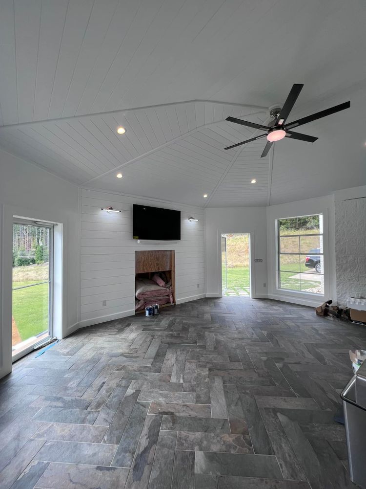 Transform your home with our expert flooring services, offering a wide range of high-quality materials and precision installation to enhance the beauty and functionality of your space. for Cote Builders in Tryon, NC