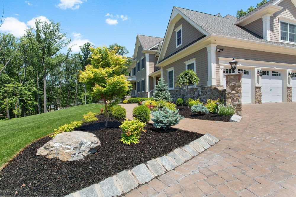 Our Mulch Installation service offers homeowners a hassle-free way to enhance their landscaping by professionally installing mulch, providing weed control, and promoting healthy plant growth. for Oasis Landscaping LLC  in El Paso, TX