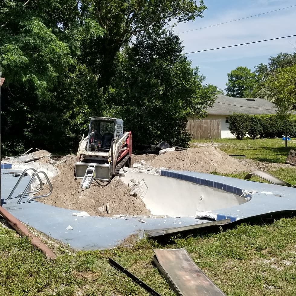 Our demolition service efficiently removes existing structures and obstacles, paving the way for new landscaping or hardscaping projects, ensuring a clean slate to enhance your outdoor environment's beauty and functionality. for Powell Environmental Services in Deltona, FL
