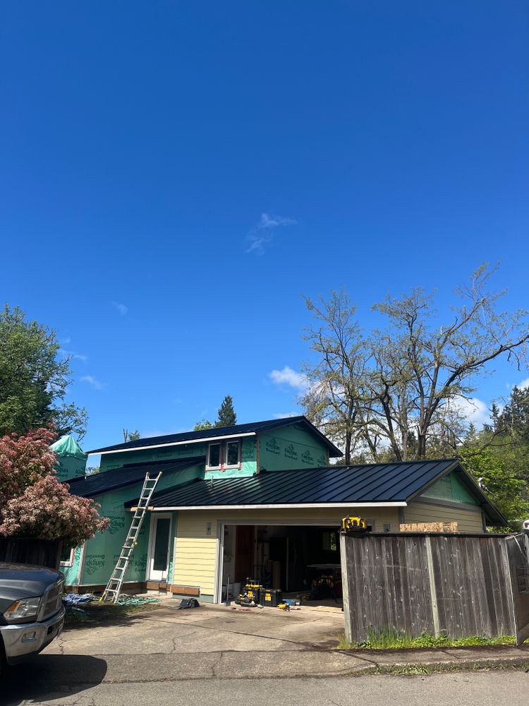 Our Metal Roofing service offers durable and long-lasting roofing solutions for your home, providing increased energy efficiency and protection against harsh weather conditions while adding a sleek, modern look to your property. for Oregon Shield Roofing and Construction LLC in Springfield , Oregon