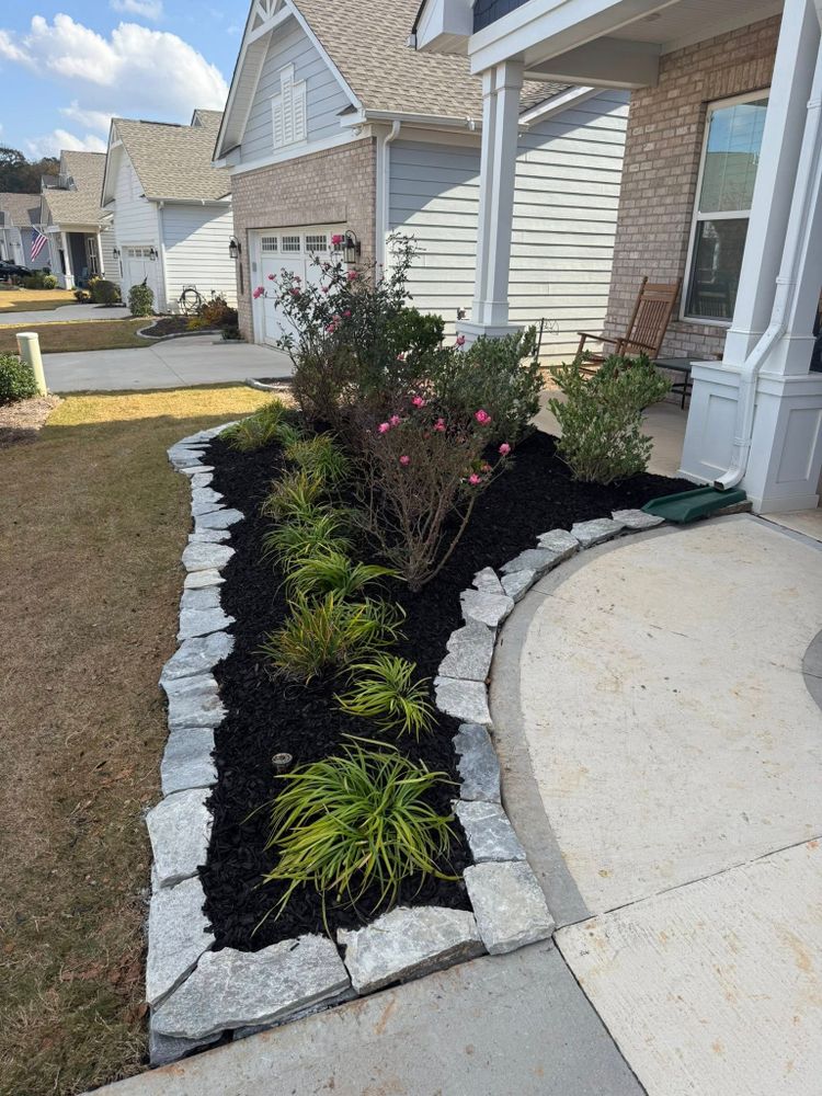 Transform your backyard into a personal oasis with our Outdoor Living Spaces service, designed to enhance comfort and aesthetics through custom patios, decks, fire pits, and more for memorable moments. for Blue Sky Turf in Monroe, NC