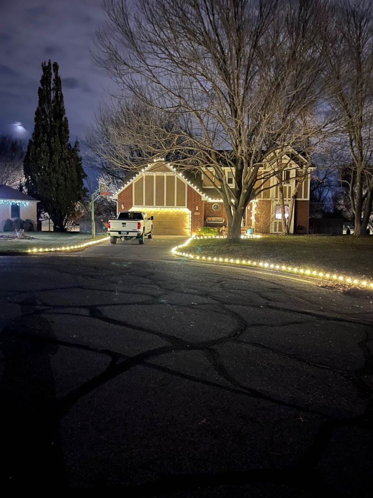 Our Holiday Lights service will illuminate your home with festive charm, providing expert installation and removal of dazzling lights to transform your landscape into a winter wonderland. Enjoy hassle-free holiday decorations! for FreshScapesPro in Wichita ,  KS