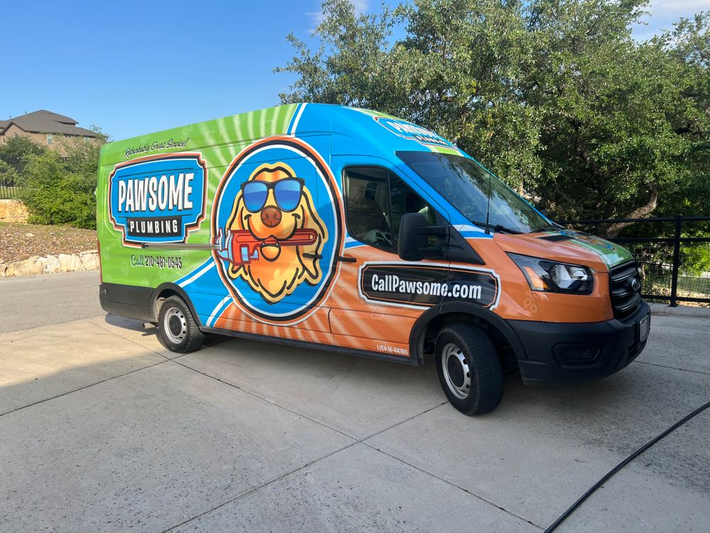 The Pawsome Plumbing service van