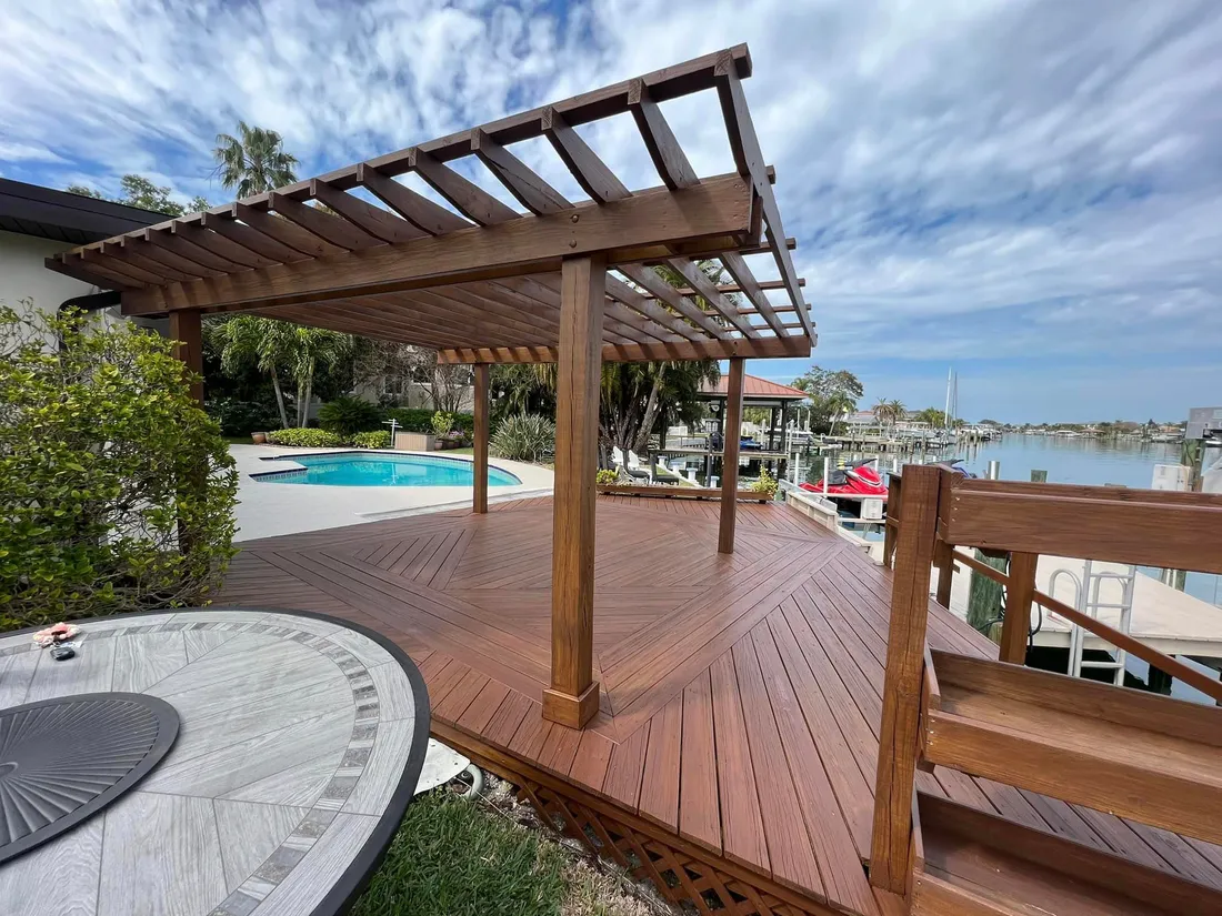 Waterfront pool deck and pergola refinished on a Pinellas County home