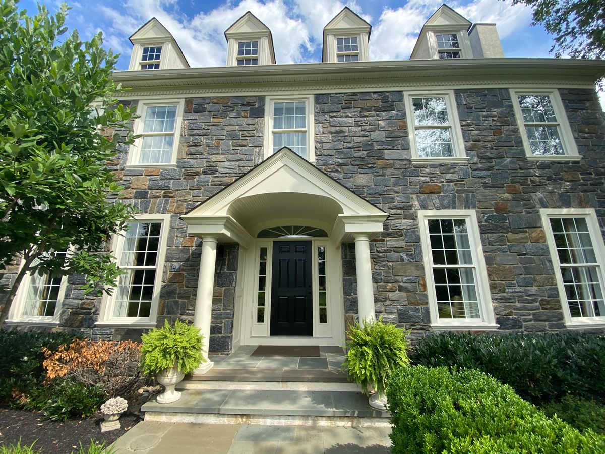 Stone colonial with white trim