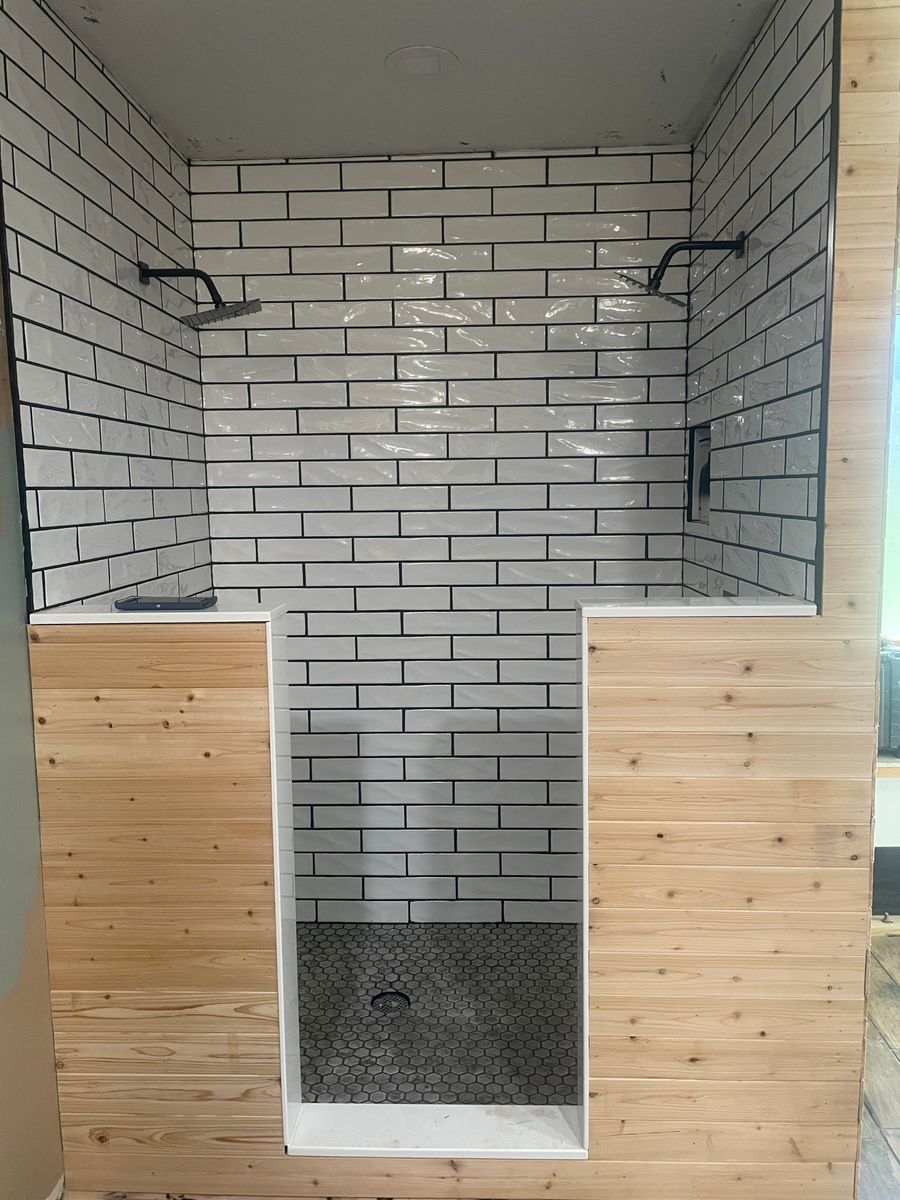 Custom tile shower remodel by Trinity General Contracting in Huntsville, TX