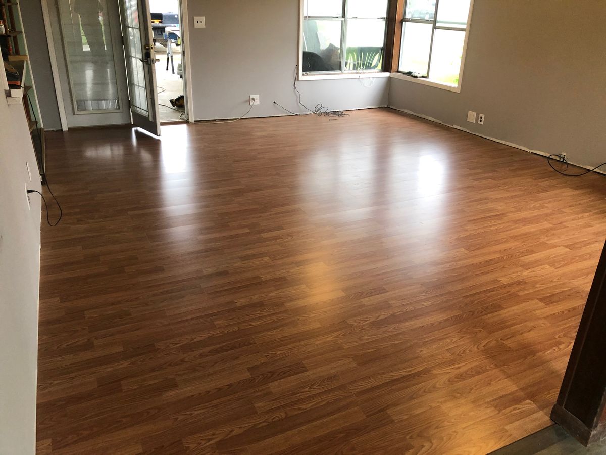 New wood-look flooring installation in Huntsville, TX