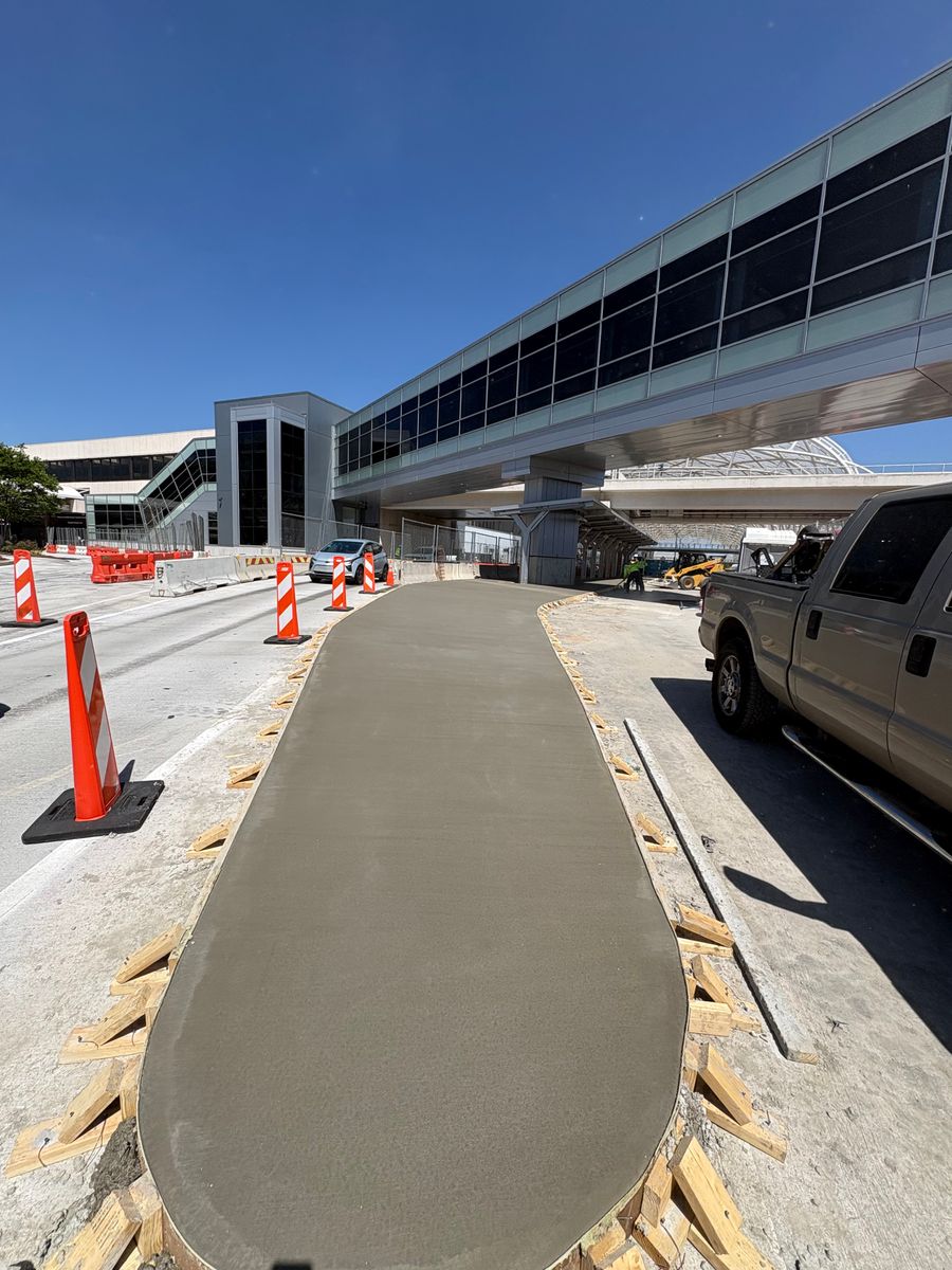 The same radius sidewalk poured and finished