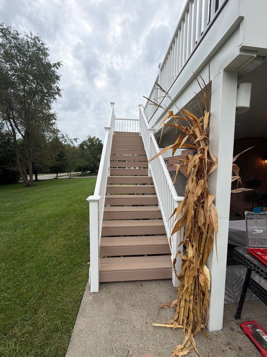 New composite deck stairs with white railings