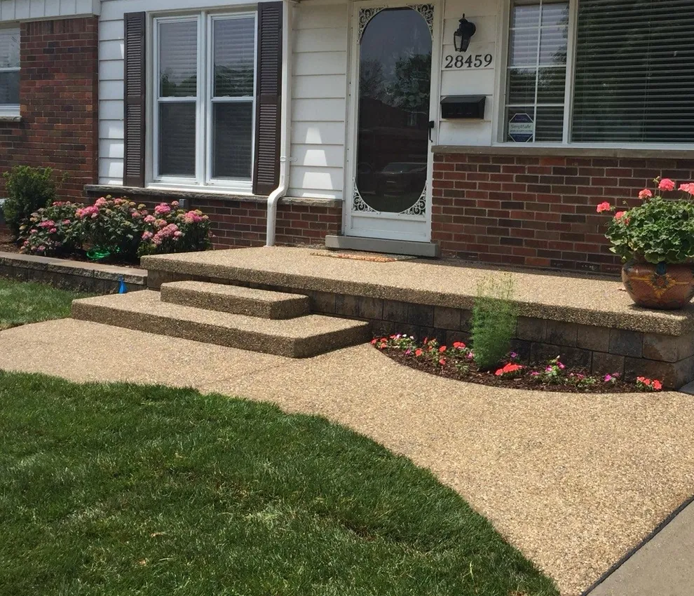 Concrete front steps and walkway built by Deerbrook Construction