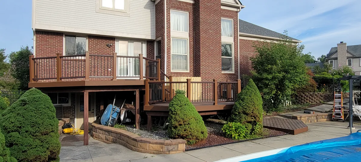 Brick home with new deck and landscaping