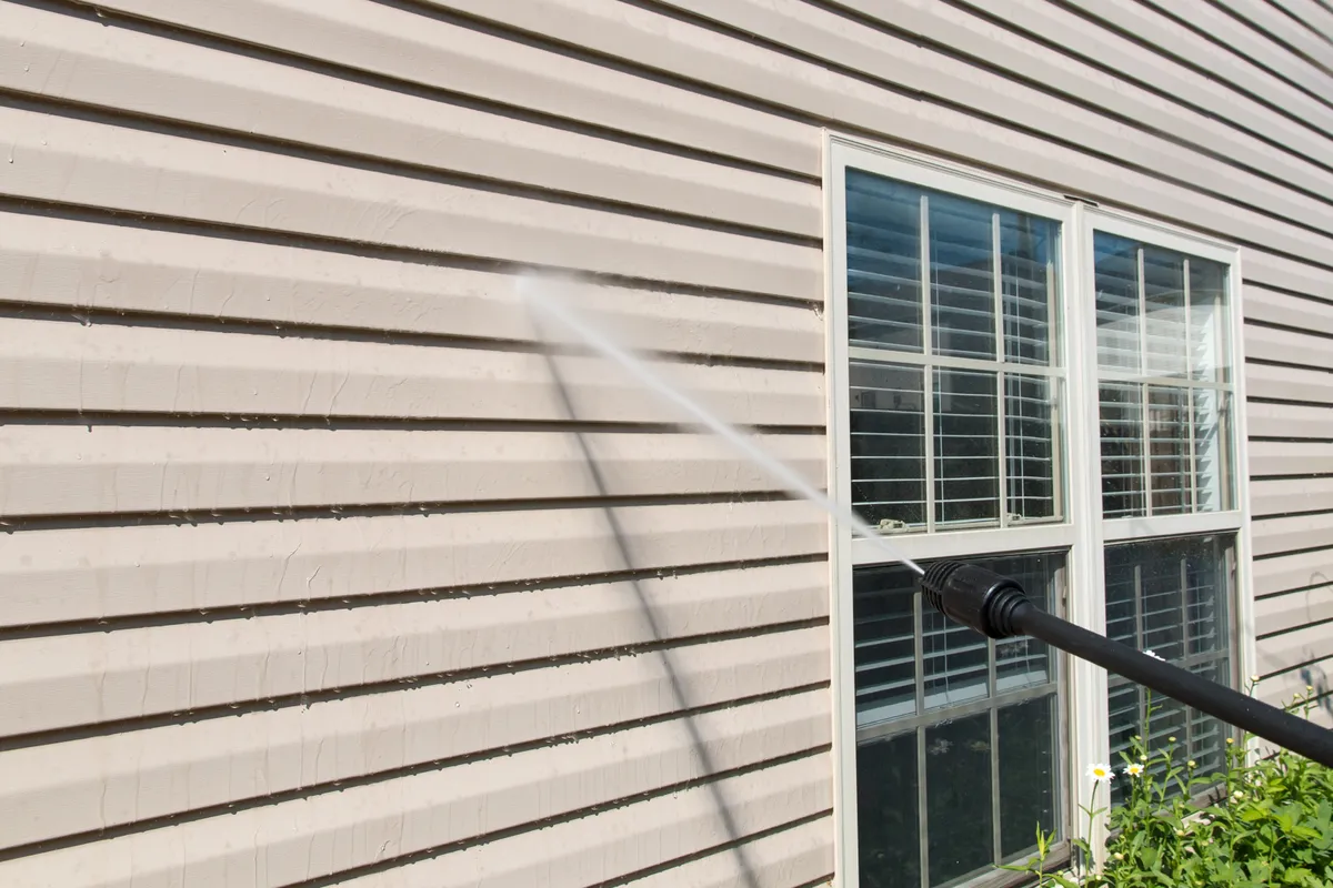 Washing exterior siding clean