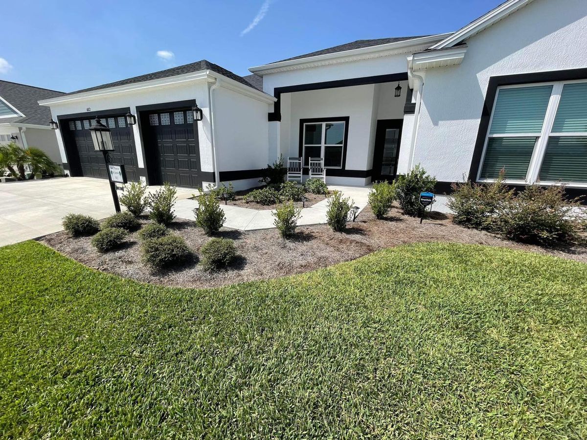 Mulching for Village Lawn Services LLC in Lake Panasoffkee, FL