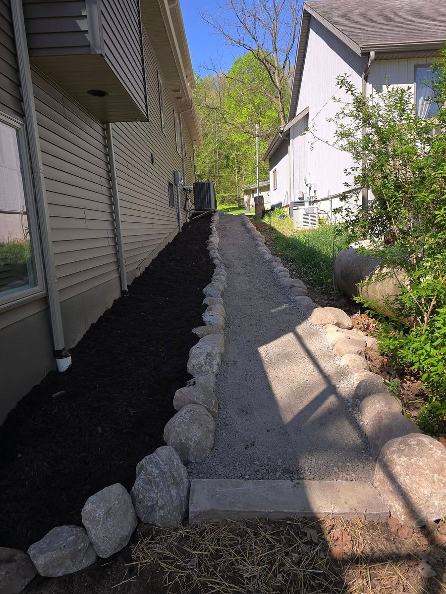 Mulch Installation for Michiana Boulders Landscaping & Excavating in Union, MI