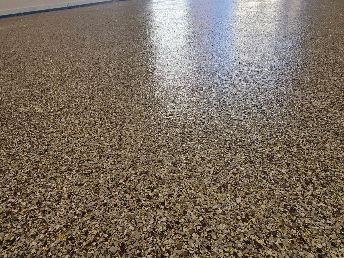 Ployaspartic Chip Coating for Majestic Concrete and Landscape in Cross Lake, MN