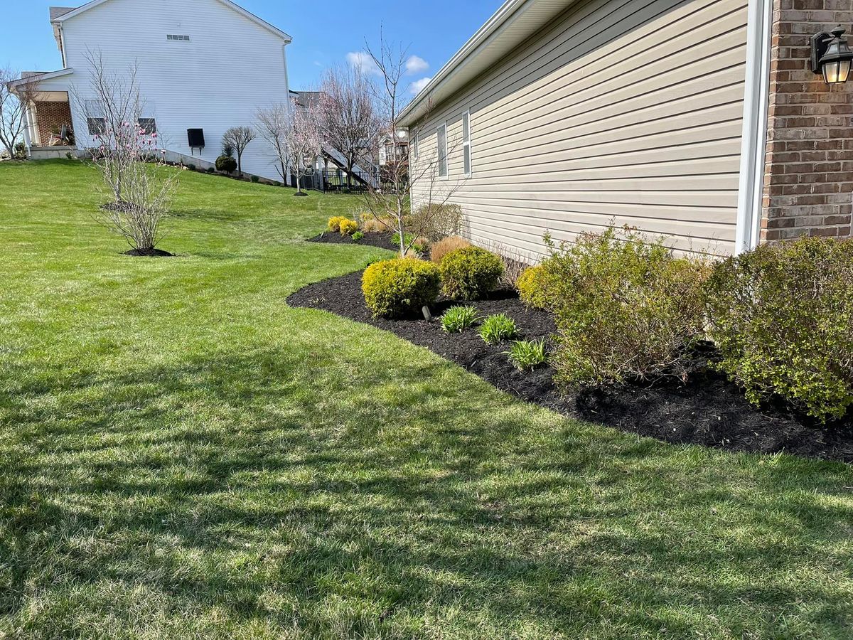 Mulch Installation for Delgado Landscape Management  in St. Charles,  MO