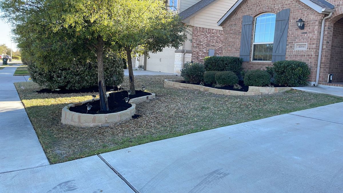 Mulching for Green Pastures Lawn Care in Bastrop, TX