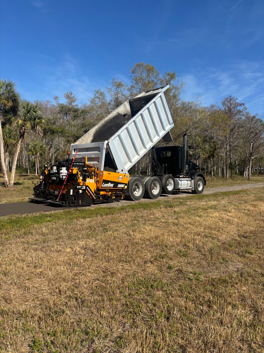 Asphalt Parking Lot Construction for Stanley & Sons Pavement in Naples, FL