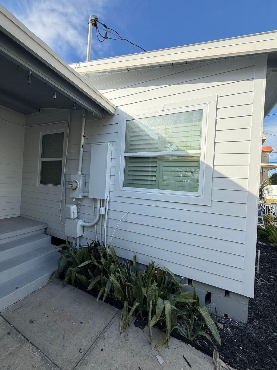 Hardie Siding Installation for Escorpio Painting in Tampa, FL