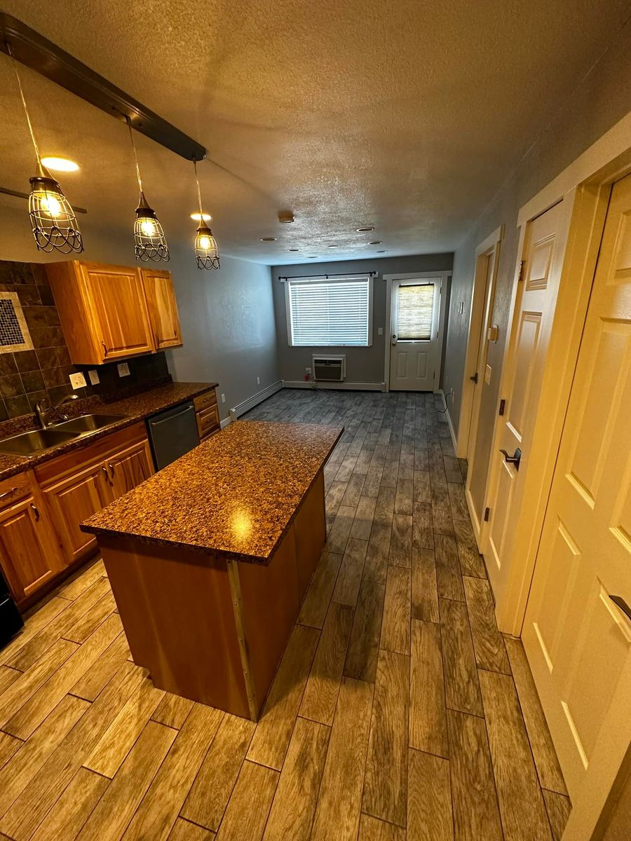 Floating Laminate, Wood, & Tile Installation for Happy Home Projects Co-op in Lakewood, CO