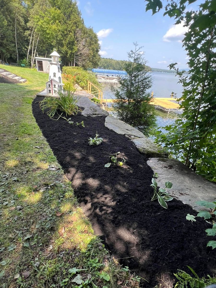 Flower Bed Restoration and Mulching for Bishop’s Property Maintenance in Franklin, VT