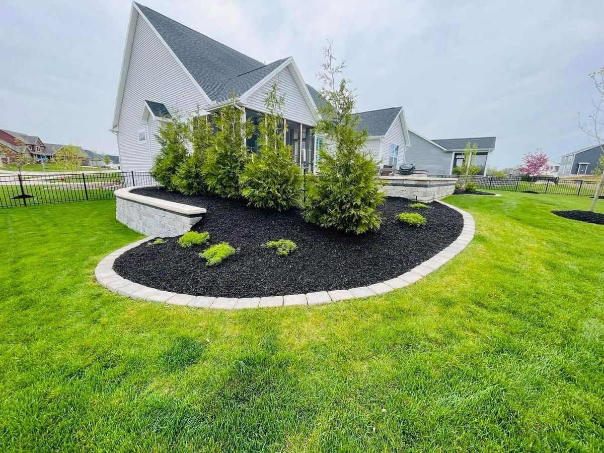 Mulch Installation for Manny's Cleaning,Lawn Care & Snow Removal Services in Peoria, IL